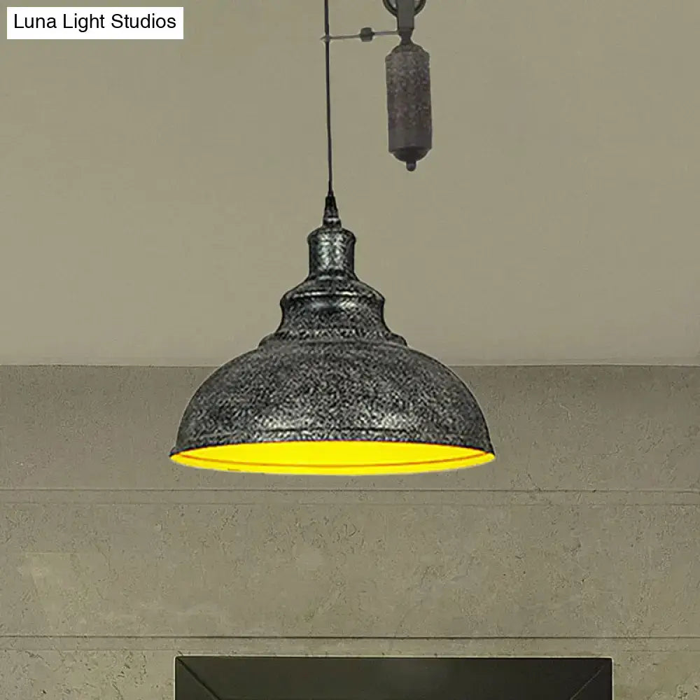 Rustic industrial dome pendant lamp with dark gray metal shade and bright yellow interior for living room lighting