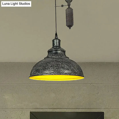 Rustic industrial dome pendant lamp with dark gray metal shade and bright yellow interior for living room lighting