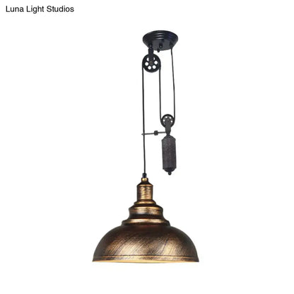 Rustic industrial dome pendant lamp with brass-finished dome shade and black metal pulley for living room lighting