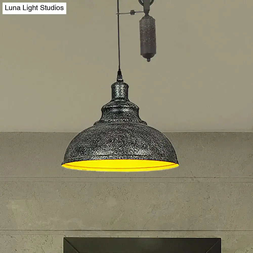 Decorbites rustic industrial dome pendant lamp with dark metal shade and warm yellow glow for living room lighting