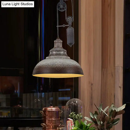 Decorbites™ rustic industrial dome pendant lamp with dark metallic finish and warm yellow interior glow for living room lighting