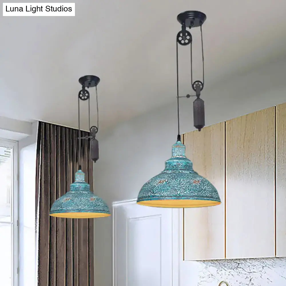 Teal vintage-style rustic industrial dome pendant light with textured distressed finish and yellow interior lining