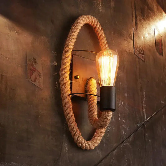 Rustic industrial wall lamp with natural hemp rope frame and exposed edison bulb for bedroom decorbites hemp rope design