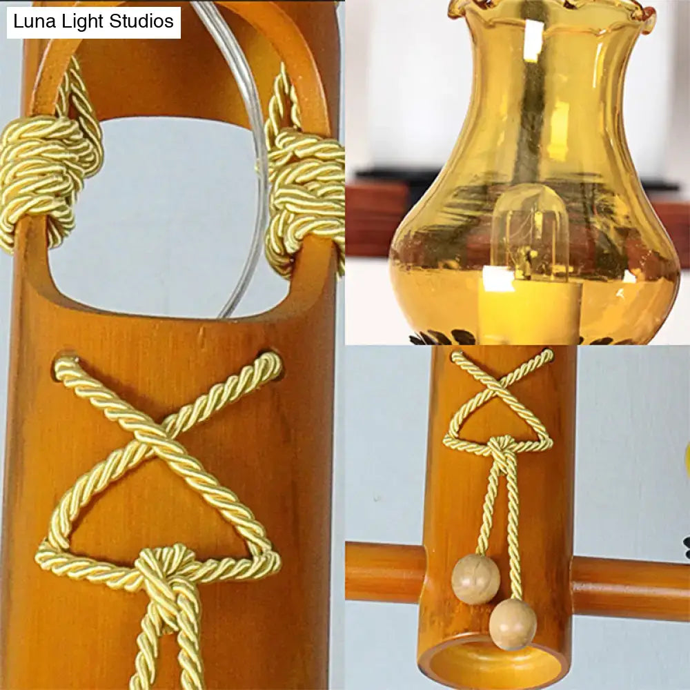 Decorbites™ retro black yellow pendant light with warm amber glass lantern, bamboo frame, and golden rope kerosene island light