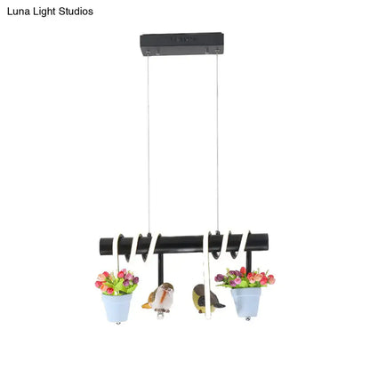 Black decorbites rustic led island pendant light with blue flower pots and bird figurines on white spiral cords