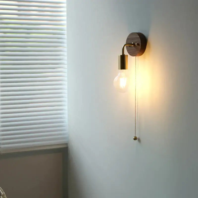 Rustic led walnut wood wall sconce with warm-toned brass fixture and exposed filament bulb for bedroom decorbites led walnut