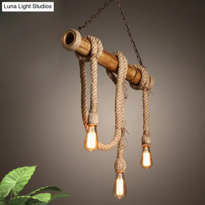 Decorbites lodge industrial beige island light with adjustable rope, bamboo poles, and three exposed edison bulbs