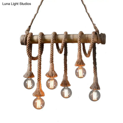 Rustic beige bamboo island light by decorbites™ featuring thick braided rope and frayed tassel cords with open bulbs