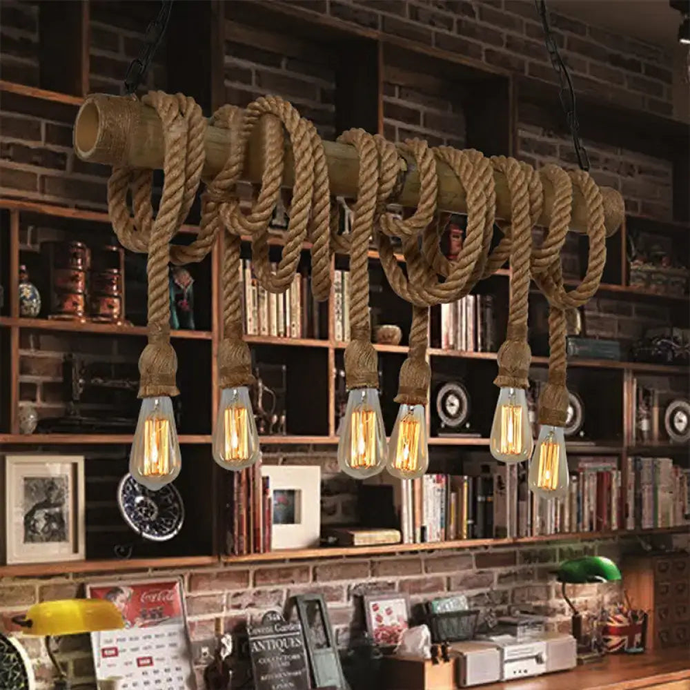 Rustic industrial island light with bamboo pole, beige rope coils, and five exposed edison bulbs by decorbites lodge