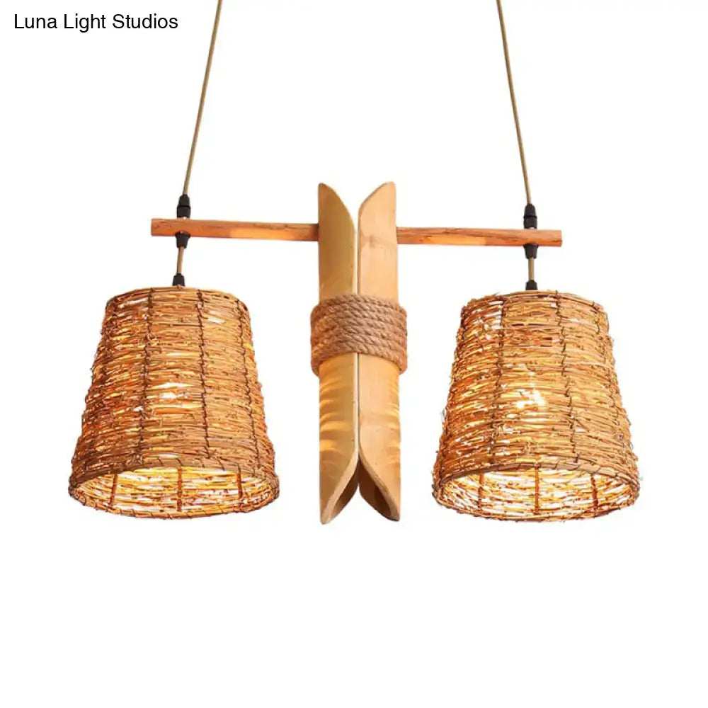 Natural woven rattan pendant light fixture with bamboo accent wrapped in rope for rustic countryside lighting
