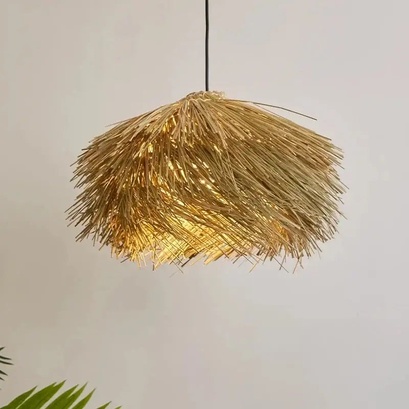 Rustic natural straw shade pendant light with warm golden hues crafted from woven straw to bring warmth to dining rooms
