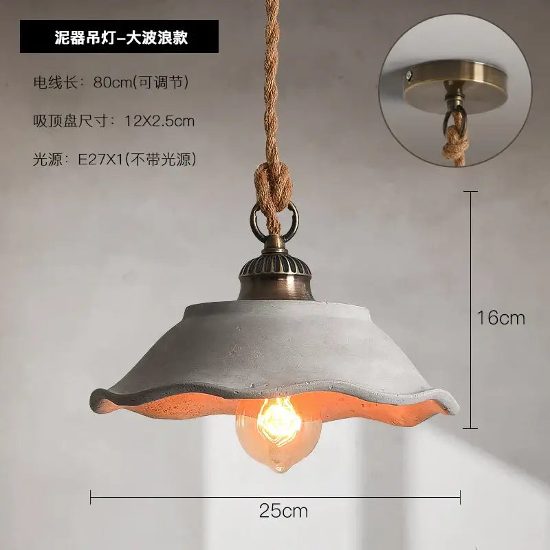 Rustic off white ceramic pendant light with wavy grayish white shade and orange glow in decorbites cement loft style