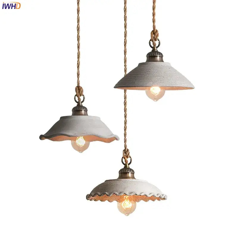 Rustic off white ceramic pendant light trio with textured shades and twisted rope in decorbites cement loft style