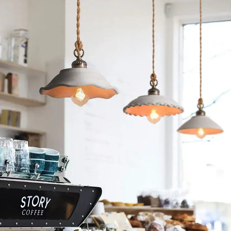 Rustic off white ceramic pendant light trio with gray shades and twisted rope cords for decorbites cement loft style