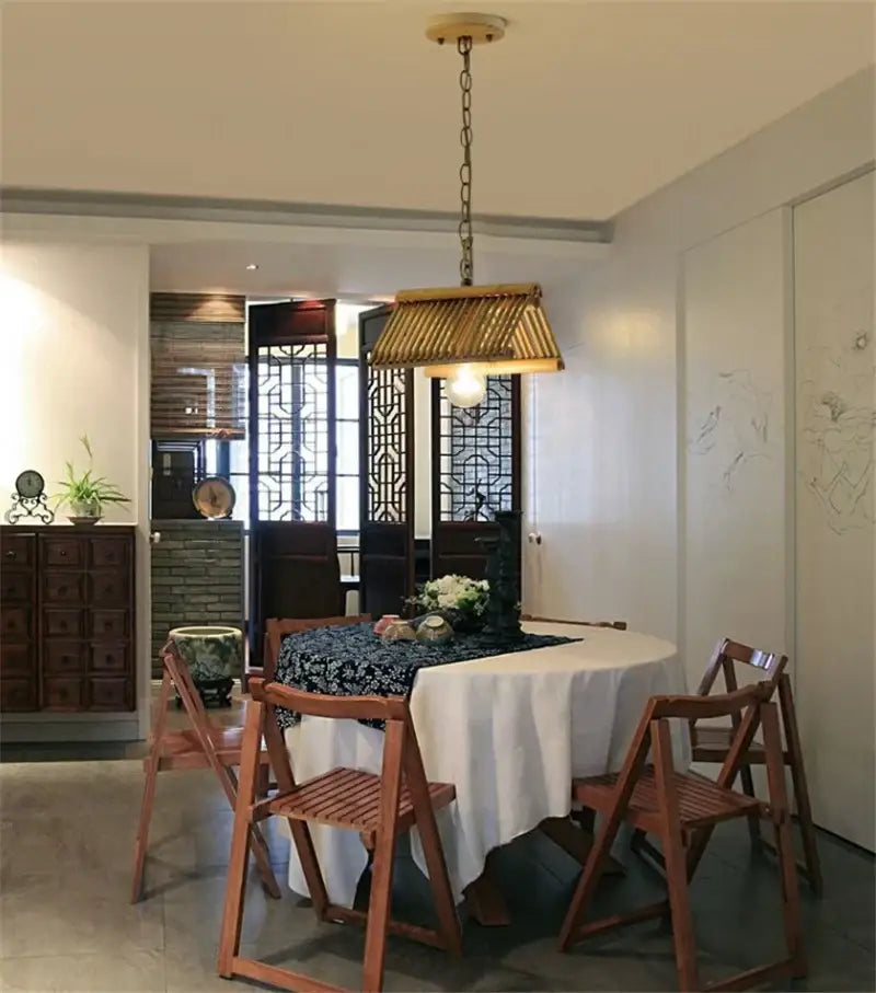 Rustic slatted wood bamboo pendant chandelier kitchen lighting with woven bamboo shade and brass chain by decorbites bamboo pendant