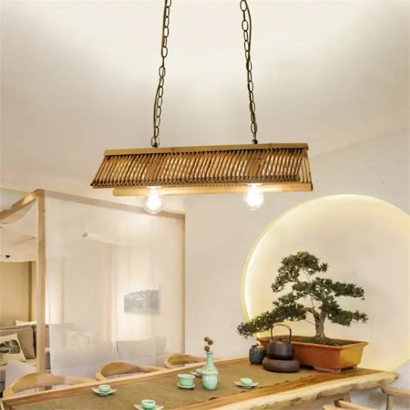 Rustic slatted wood bamboo pendant chandelier with rattan rectangular light and dark metal chains by decorbites bamboo pendant