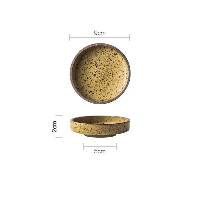 Rustic speckled ceramic sauce dish with yellow glaze and dark brown rim measuring 9cm by decorbites ceramic sauce dishes