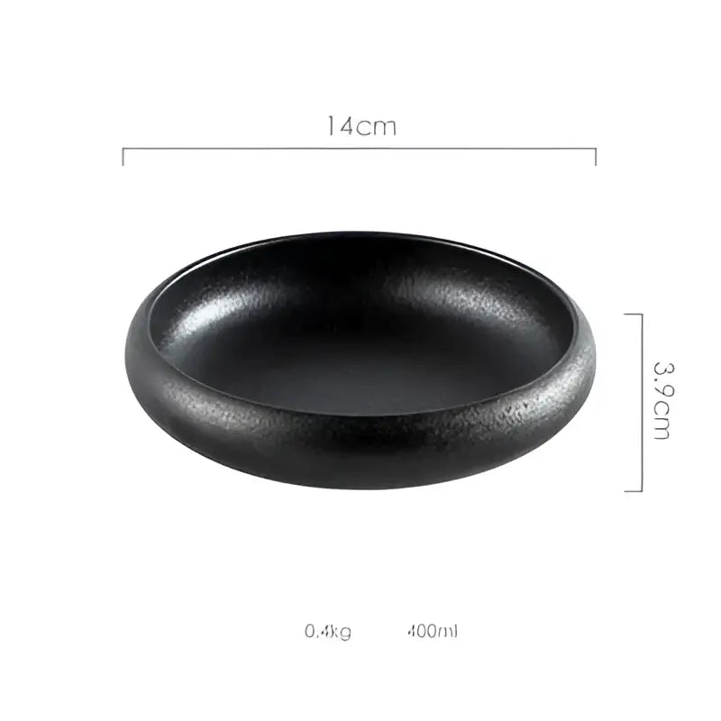 Black ceramic kimchi plate with matte finish and rounded edges for rustic speckled ceramic kimchi dining use