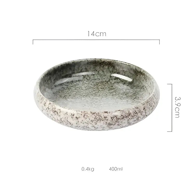 Rustic speckled gray ceramic kimchi plate with smooth rounded rim and slightly raised edges for dining use