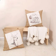 Rustic tan burlap pillow cover with black and white embroidered fashion pillow designs of deer and house panels
