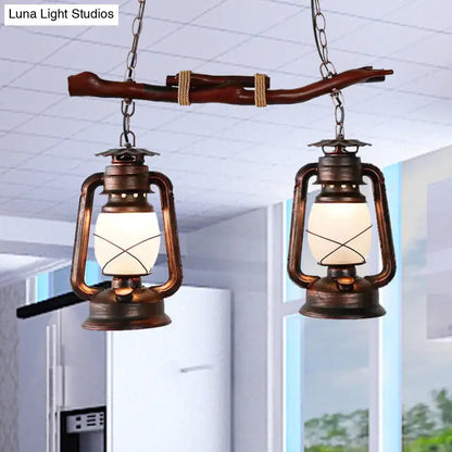 DecorBites™ vintage aged copper 2-light lantern island pendant with frosted glass globes and x-shaped wire design