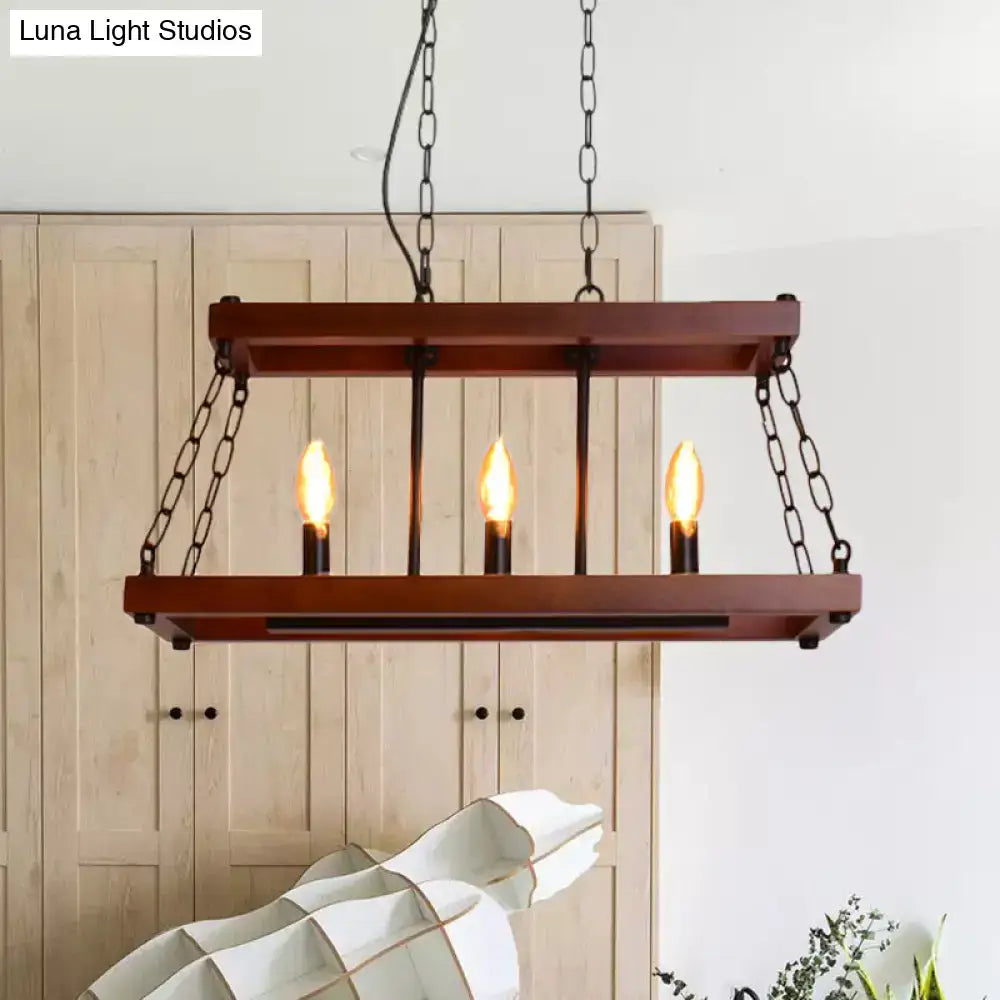 Rustic vintage brown wood chandelier with black metal chains and three exposed filament bulbs for dining room island light
