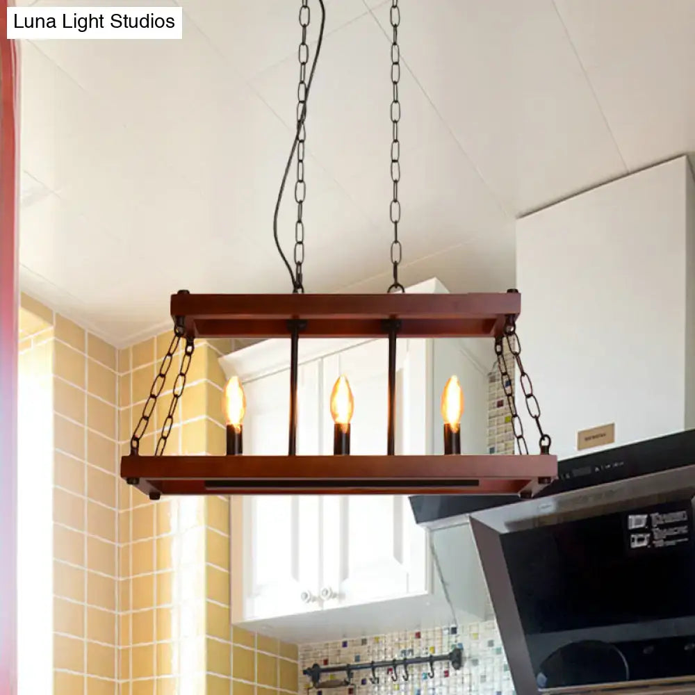 Rustic vintage brown wood chandelier with three exposed filament bulbs and black metal chains for dining room island light