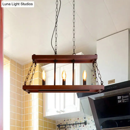 Rustic vintage brown wood chandelier with three exposed filament bulbs and black metal chains for dining room island light