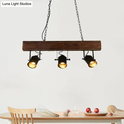 Decorbites vintage 3-headed metal pendant light with black barrel shades on rustic linear wooden beam for restaurant lighting