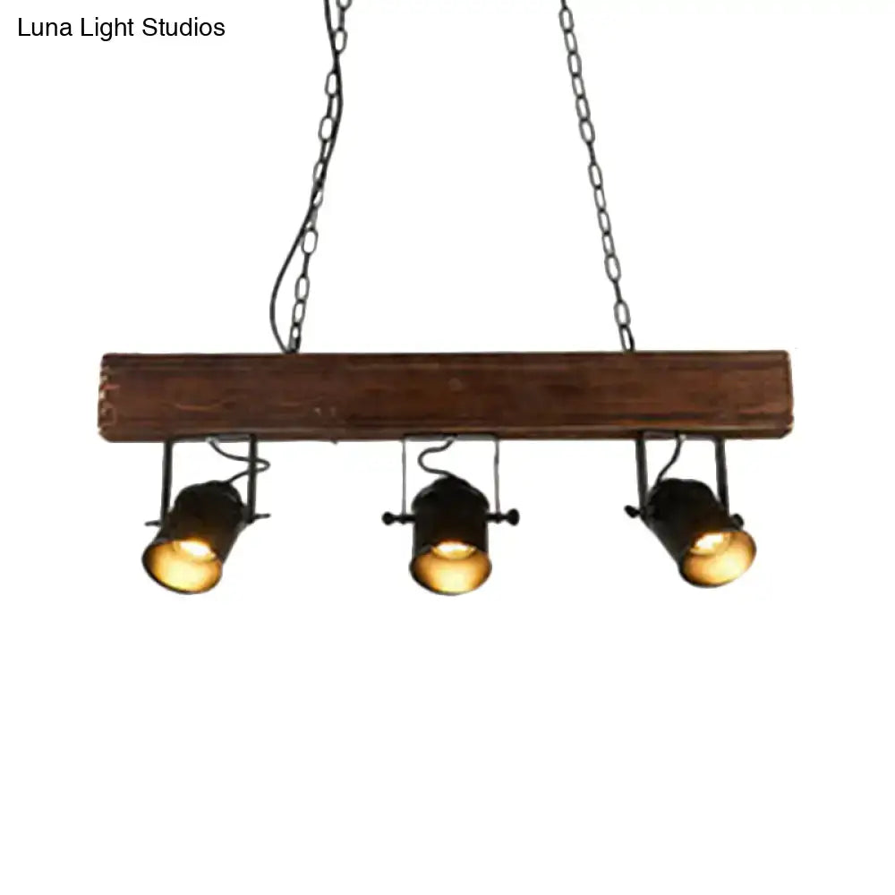 DecorBites™ vintage pendant light with three black metal spotlights on rustic linear wooden beam for restaurant lighting