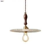 Rustic walnut and brass cullet glass led pendant dining room light with dark wood handle and textured frosted glass disc
