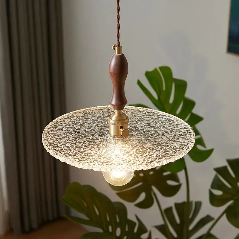 Rustic walnut and brass cullet glass led pendant dining room light with warm-toned textured glass and wooden handle decorbites cullet glass