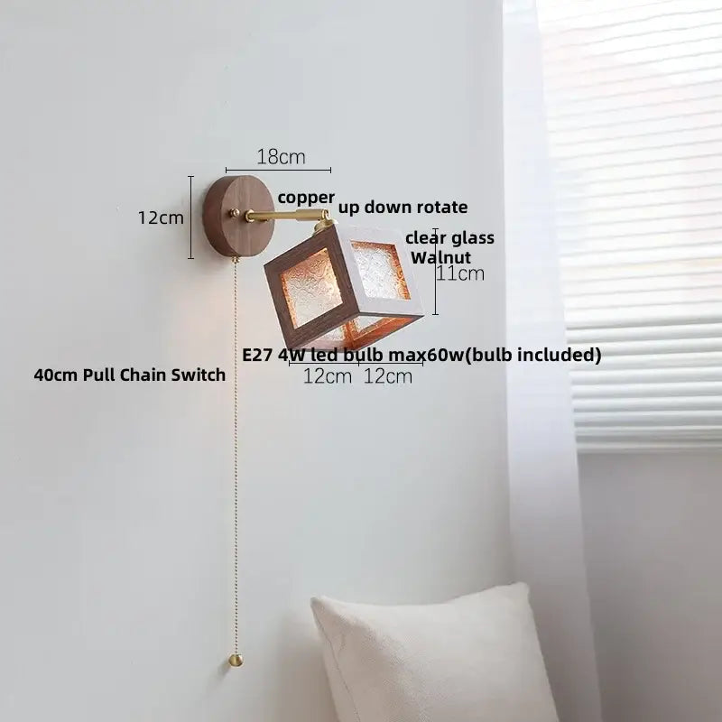 Rustic walnut and brass glass wall light fixture with copper finish and clear glass cube design for bedroom sconce