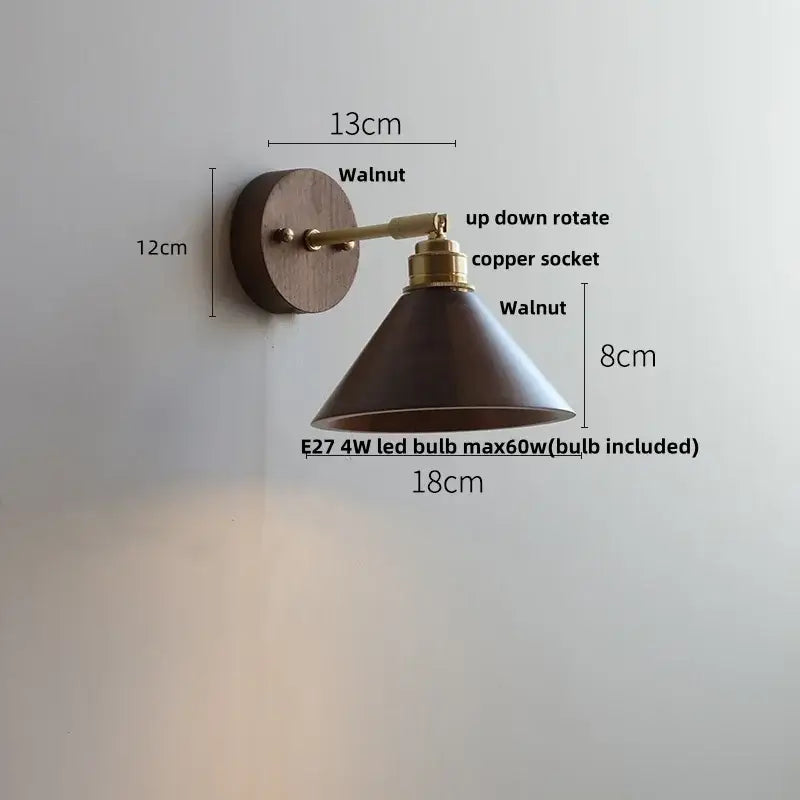 Rustic walnut and brass glass wall light fixture with dark walnut wood base and conical shade for bedroom use