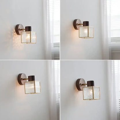 Rustic walnut wood and brass wall sconce with clear glass and dark bronze metal base for bedroom lighting