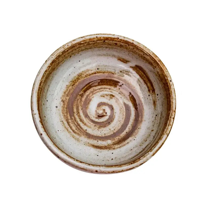 A rustic white speckled ceramic seasoning sauce dish with swirling brown and white glaze from decorbites ceramic seasoning