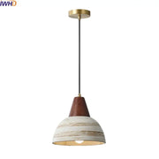 Rustic white and wood ceramic pendant light with warm brass mount and black cord ideal for kitchen decorbites ceramic wood led