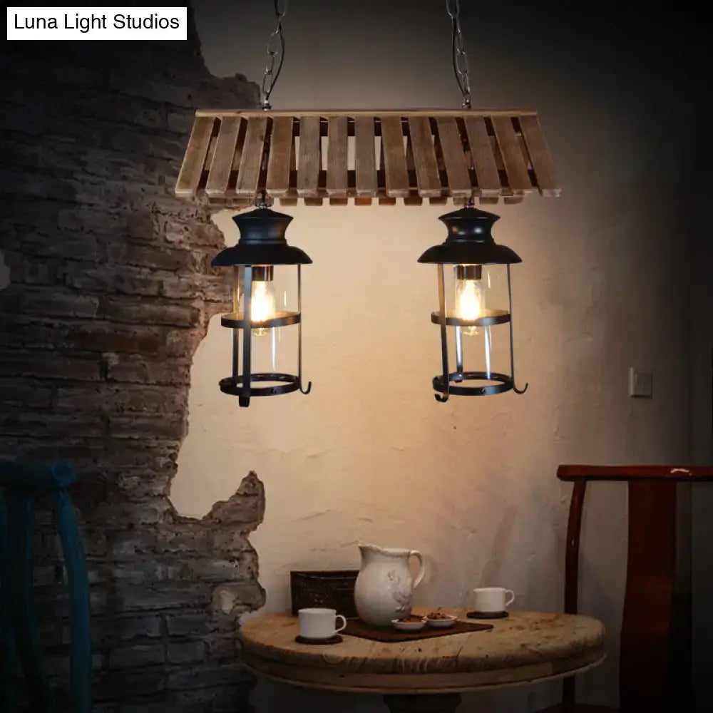 Rustic wood and black antique cylinder island lamp kitchen light featuring wooden slats and two black lantern bulbs