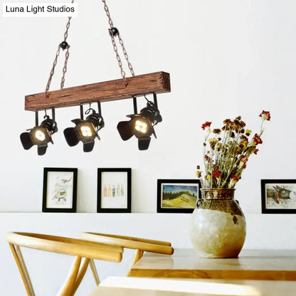 Rustic wood and black metal 3 light island pendant kitchen light with three black industrial spotlight fixtures