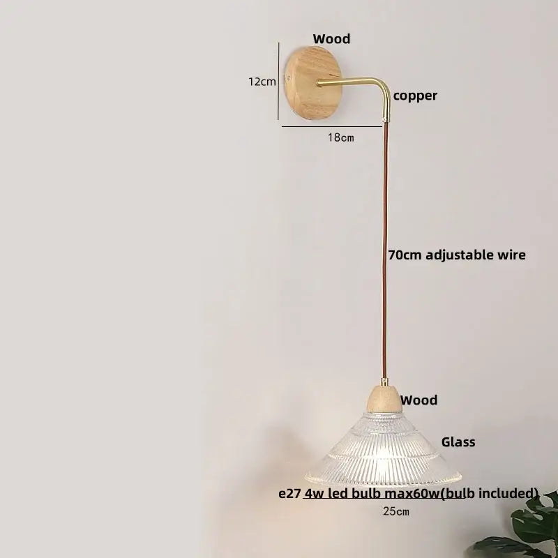 Rustic wood and brass wall light with natural wood base, copper arm, clear glass shade, and pull chain switch