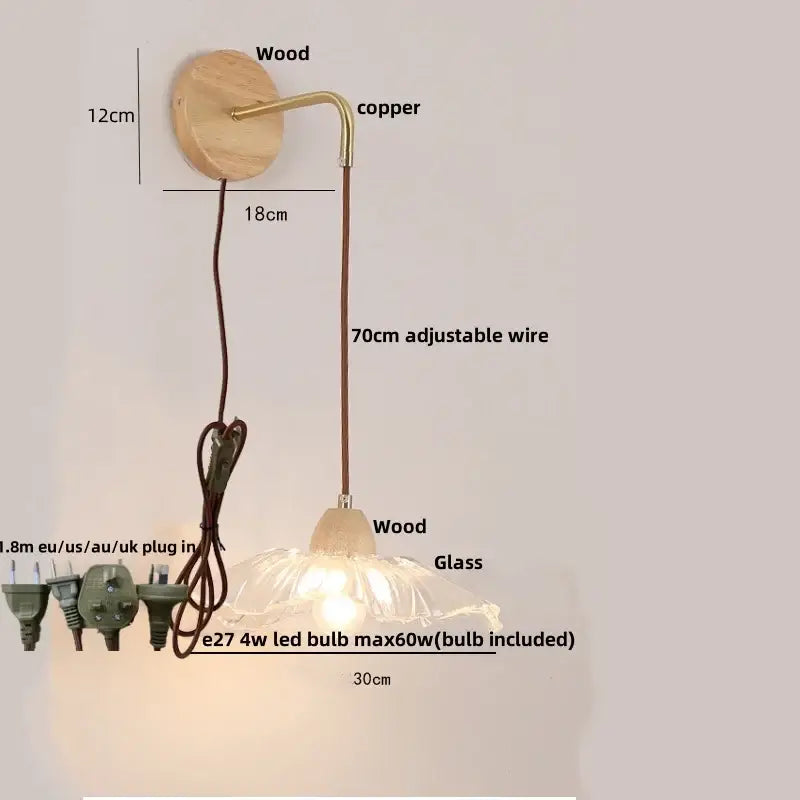Rustic wood and brass wall light with clear glass shade and copper accents featuring a pull chain switch