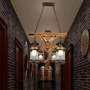 Rustic wooden chandelier with brass lanterns and glass panels in decorbites™ bronze coastal 4-light island light fixture