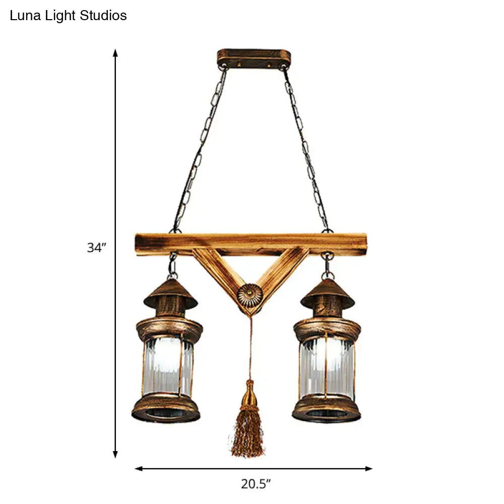 Decorbites bronze coastal glass lantern 4-light island light fixture with antique brass and decorative tassel centerpiece