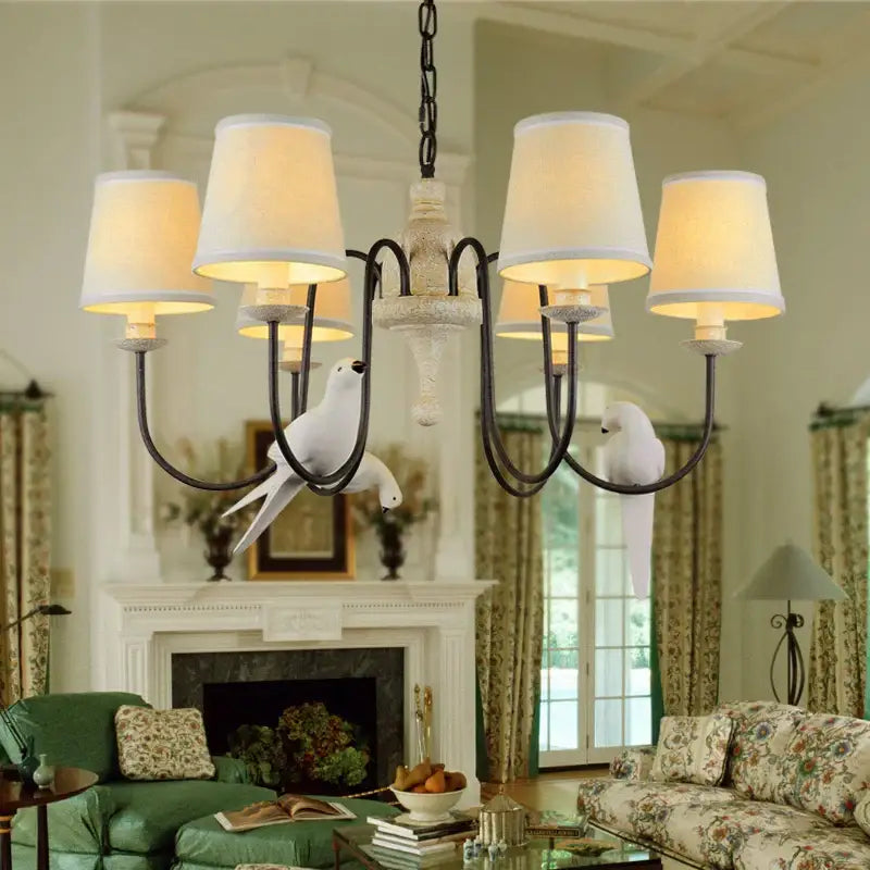 Rustic wood and iron decorbites bird lamp dining room chandelier with six cream fabric shades and white bird figurines