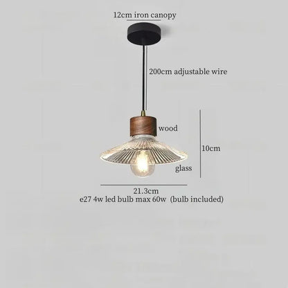 Rustic wood and ribbed glass led pendant light with black iron canopy and adjustable wire for dining room