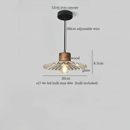 Rustic wood and ribbed glass led pendant light with black iron canopy and adjustable wire for dining room lighting
