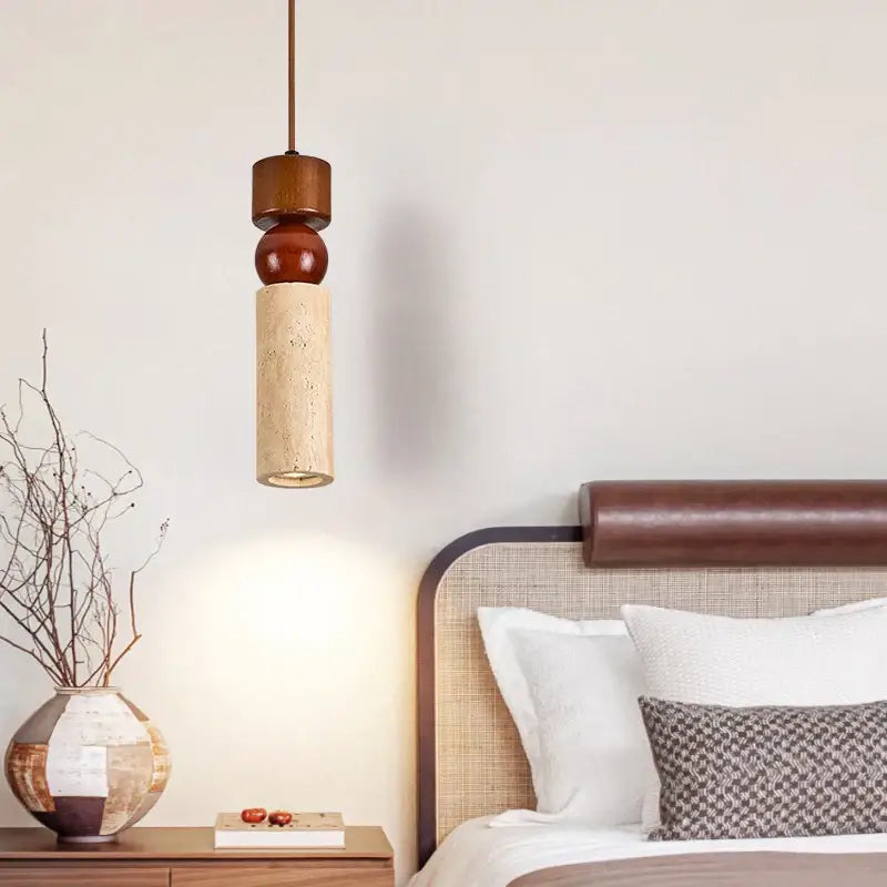A modern pendant lamp with warm wood tones and beige decorbites columnar stone led for dining room decor
