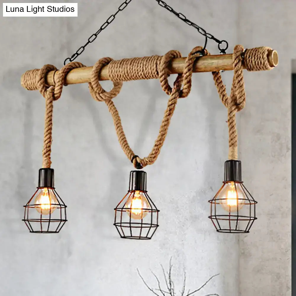 Decorbites vintage black metal island light with three caged bulbs and a rope-wrapped wood beam for dining room use