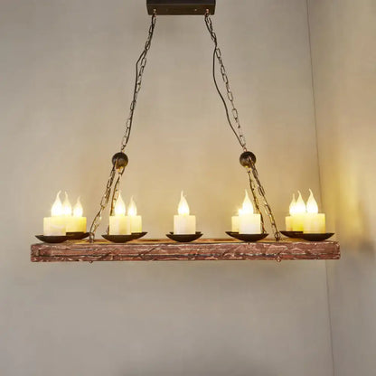 Rustic copper-toned wood candelabra pendant light with six led candles in black metal holders for dining room