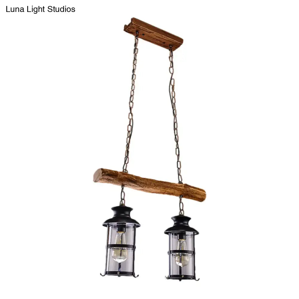 Rustic wooden beam pendant light with two black lanterns and clear glass in decorbites wood design brown island lighting